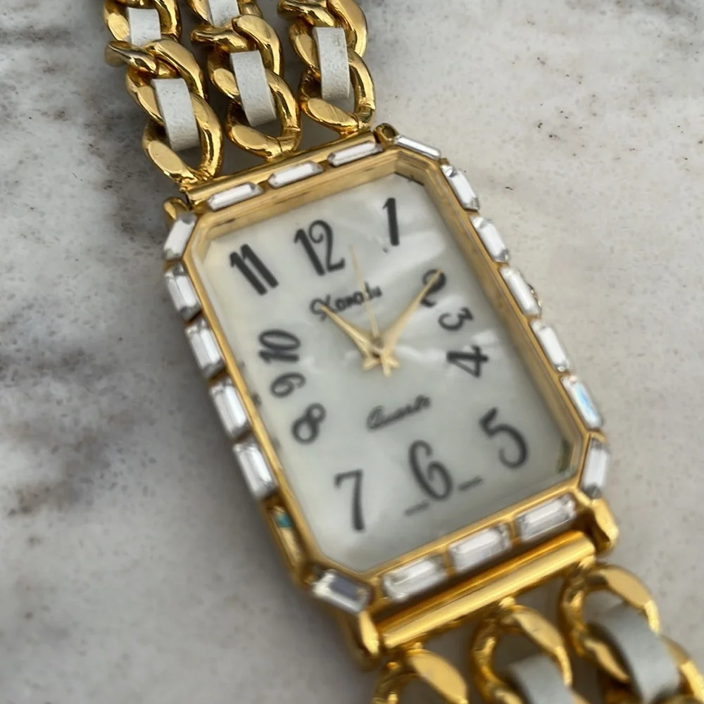 Xanadu Quartz watch in gold tone with embellishments